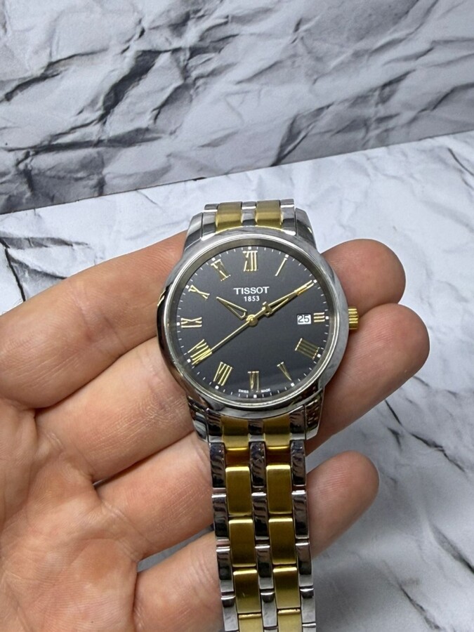 Часы TISSOT T033410 B